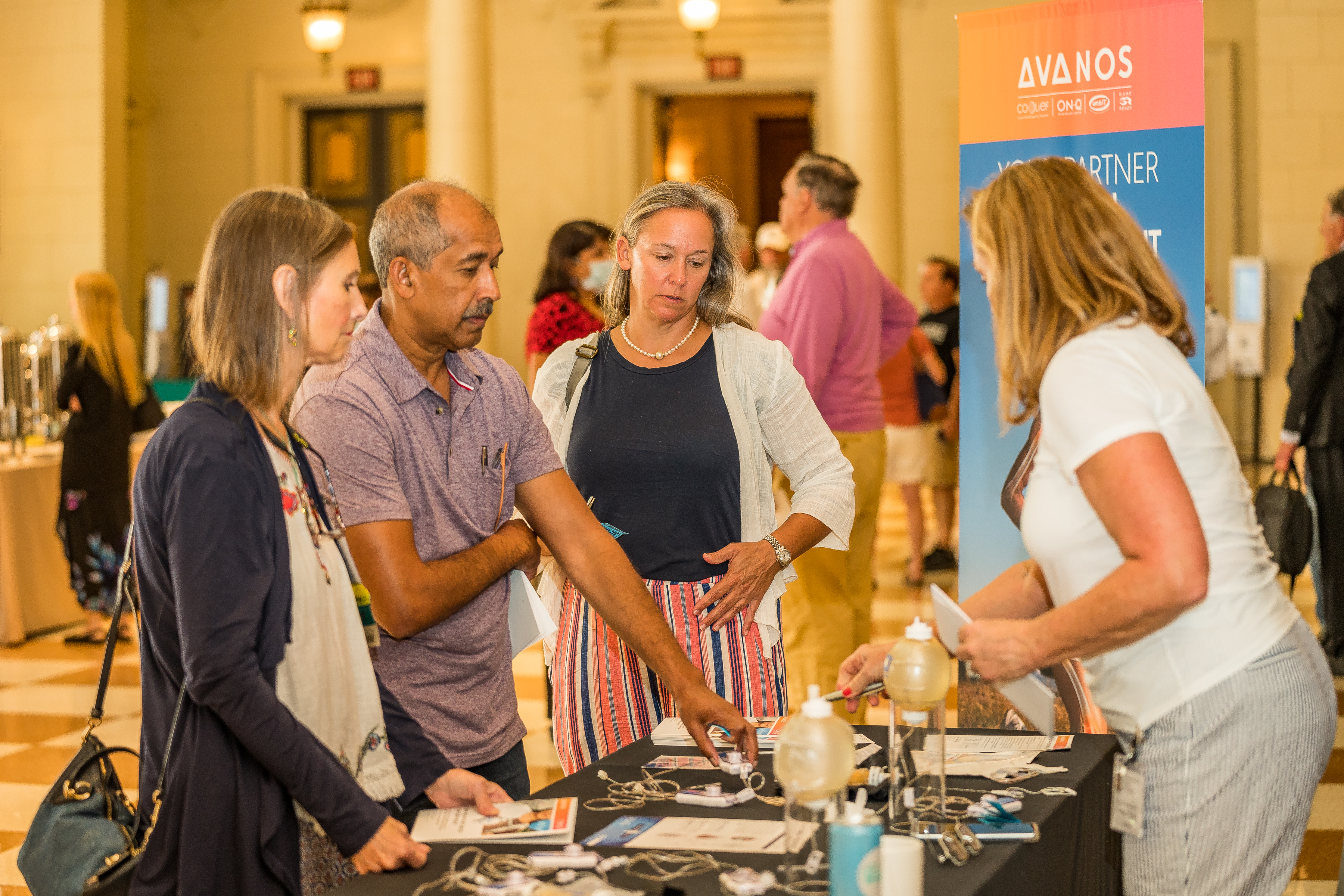 Attendees at exhibit table